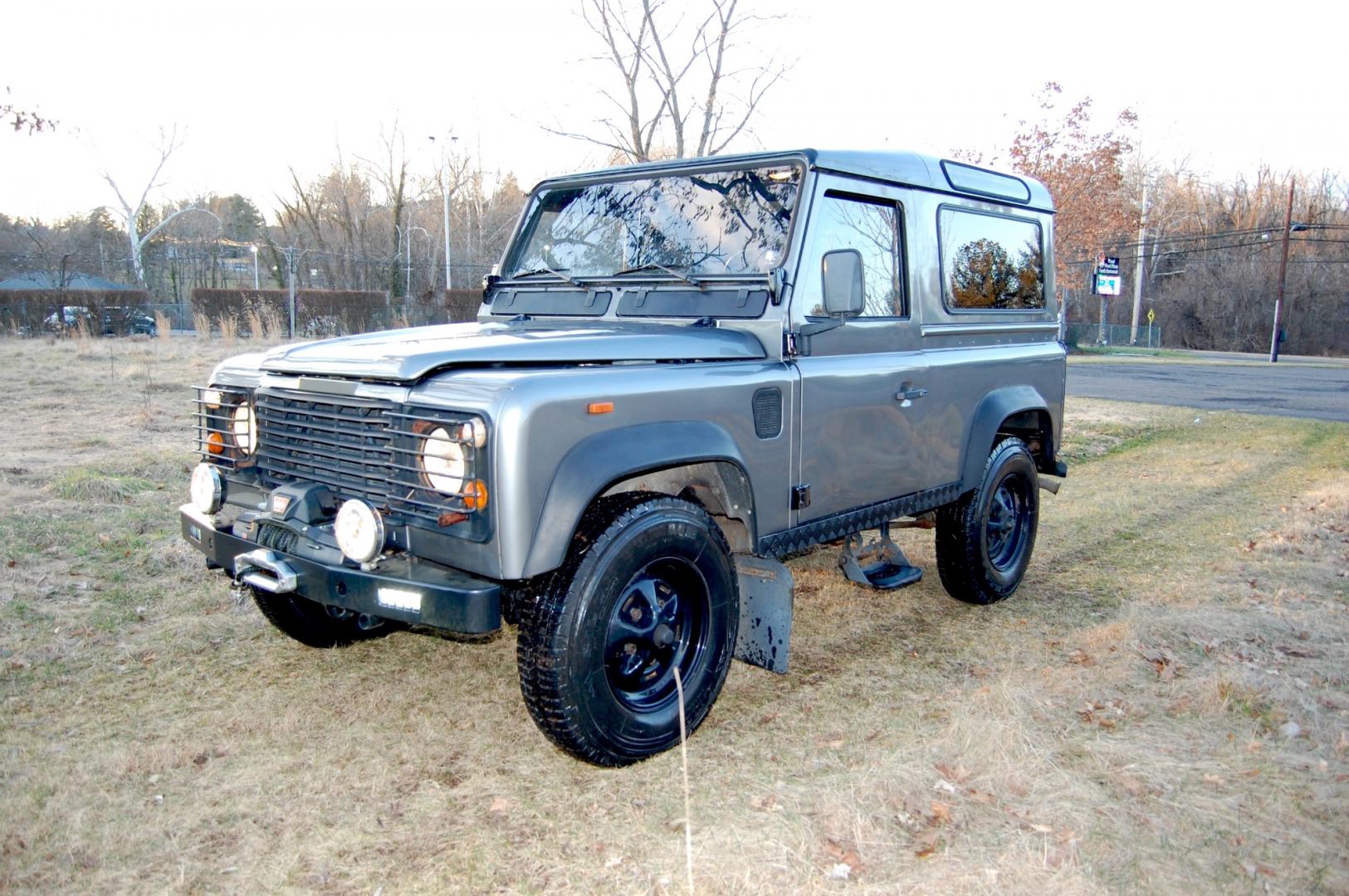 1990 Gray /Black Land Rover Defender (SALLDVAB8FA) with an Diesel engine, 5 speed manual transmission, located at 6528 Lower York Road, New Hope, PA, 18938, (215) 862-9555, 40.358707, -74.977882 - Here is a great running, great looking turn key 1990 Land Rover Defender.....Diesel engine, 5 speed manual transmission, roll up windows, black leather seats, steel wheels, 7.50R60 Silca Come 4x4 tires, fog lights, trailer hitch, Warn Zion 10-S power wynch. The engine has been rebuilt, body and i - Photo#1